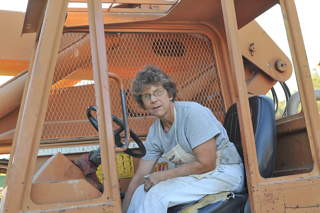 Susan Benson provided and operated the heavy equipment needed to install the quilt.