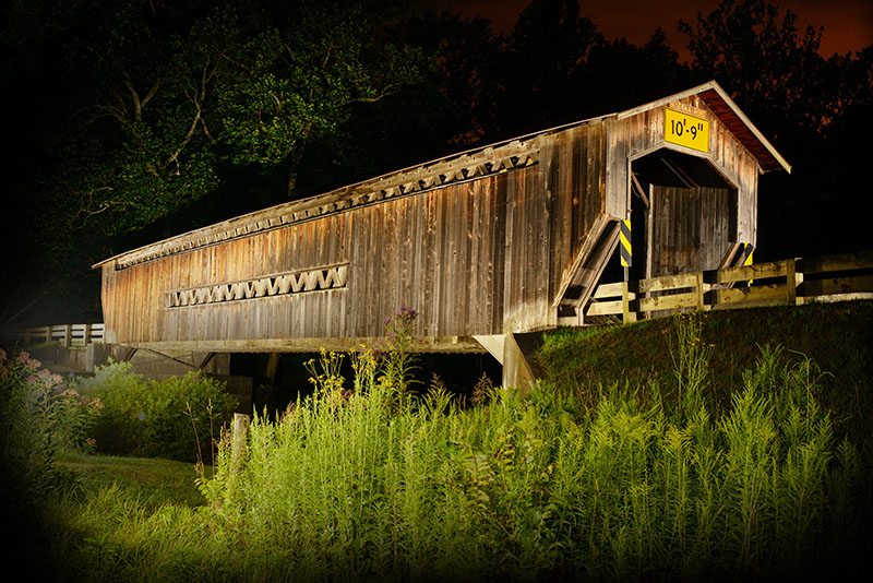 Benetka Road Covered Bridge, a Town lattice bridge in Sheffield Township. Photo by Carl E. Feather/Feather Cottage Media.