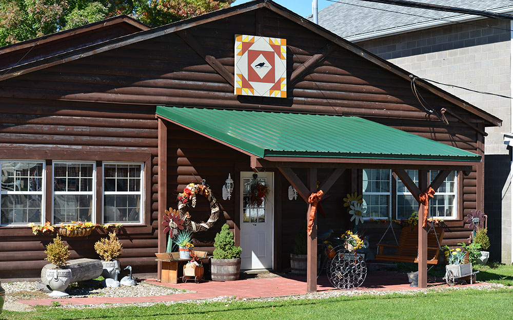 Twigs and Crows is housed in a former Hudson dealership building on Route 7, Pierpont. It is near the Caine Road and Graham Road covered bridges.