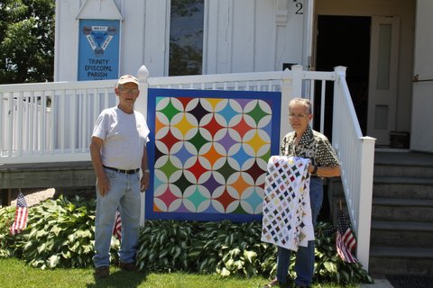 Gary Tabor, barn quilt artist, and Norma Waters, historian of the Jefferson Historical Society, on the day of the quilt dedication, June 18, 2016. Photo courtesy of Chris Angerman, who assisted with the painting.