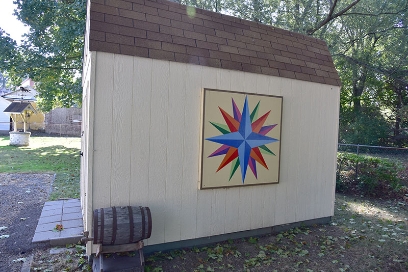 George Gates' quilt is installed on the side of an "urban barn."