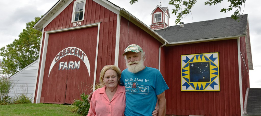 John and Mary Ellen Svoboda with their Follow the Drinking Gourd barn quilt.