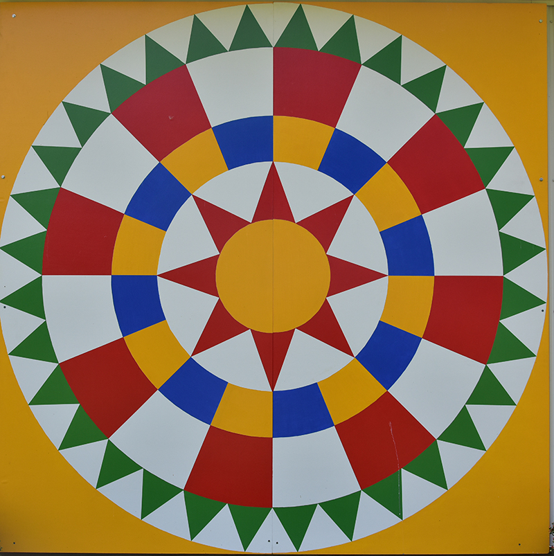 Each color in the quilt was painstakingly matched to the brand color of a specific farm tractor manufacturer.